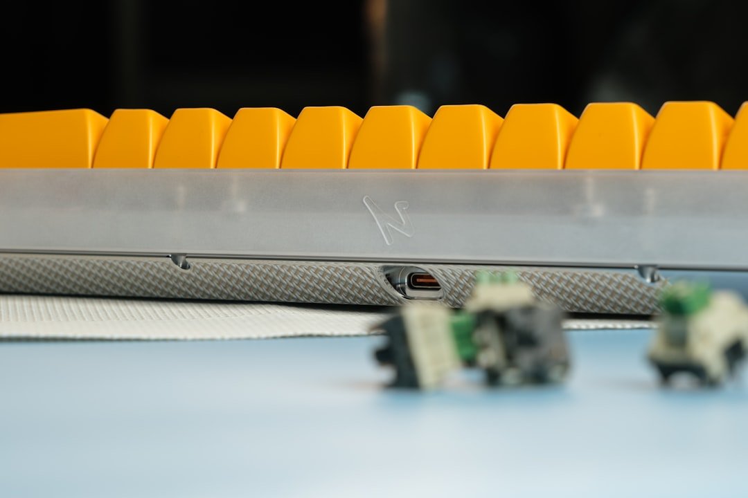 Smart power strip with multiple devices plugged in showing the on/off switch